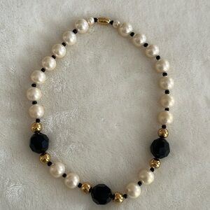 Vintage Avon necklace pearls and beads.